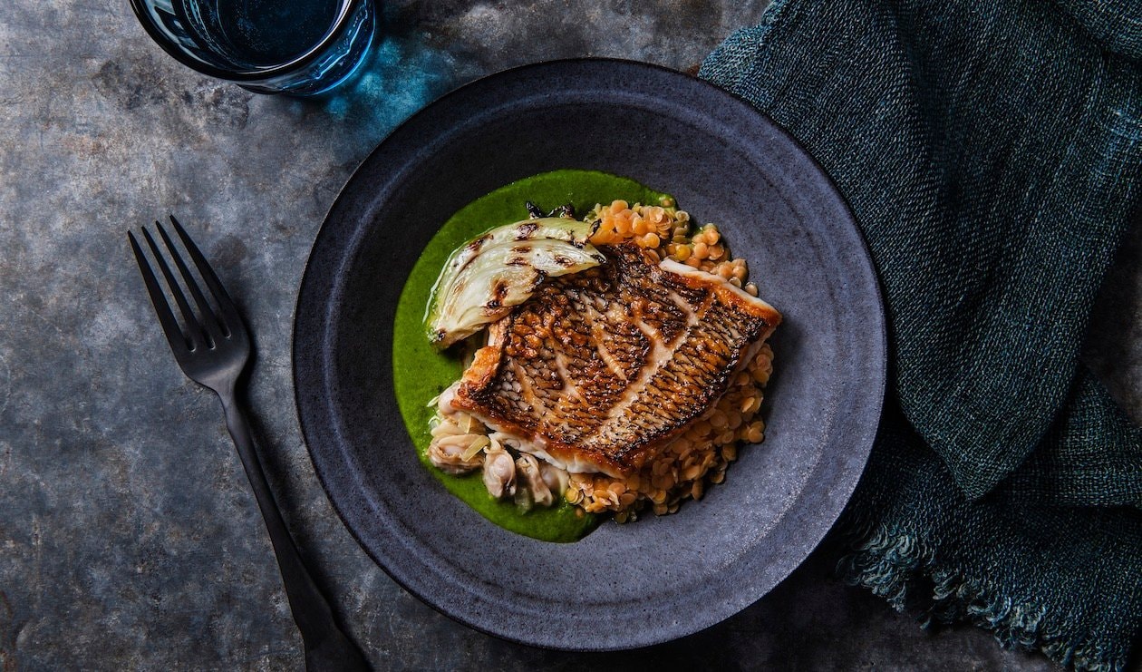 Black Sea Bass With Charred Fennel Red Lentils And Citrus Ocean Broth   Main Header 