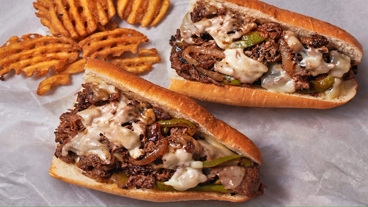 Philly Cheesesteak with Grilled Peppers and Onions – - Recipe